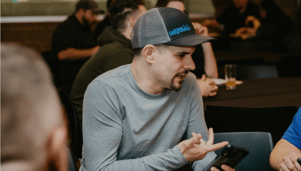 Showcasing the concept of ASOG Mastermind—auto shop professionals exchanging ideas, solving challenges, and growing together. mentorship, Supporting Auto Shop Owners At ASOG